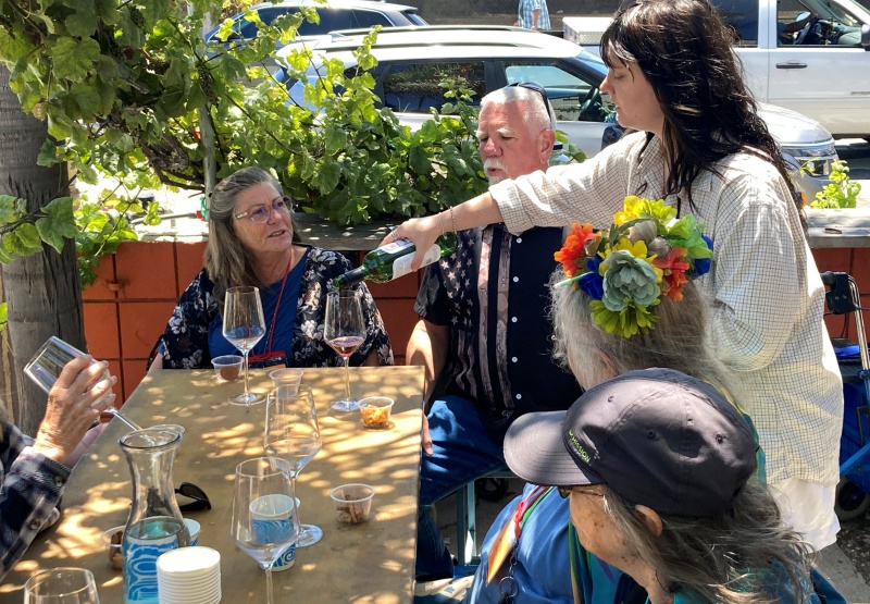 photo of couple drinking wine